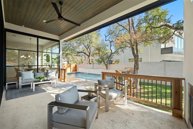 view of patio with pool water feature, a fenced in pool, outdoor lounge area, and ceiling fan