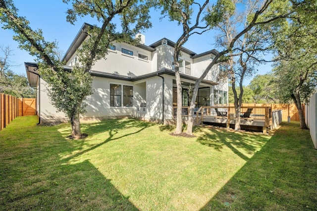 1339 Allen Rd, Austin, TX 78746 - back of house with a fenced backyard, a wooden deck, and stucco siding