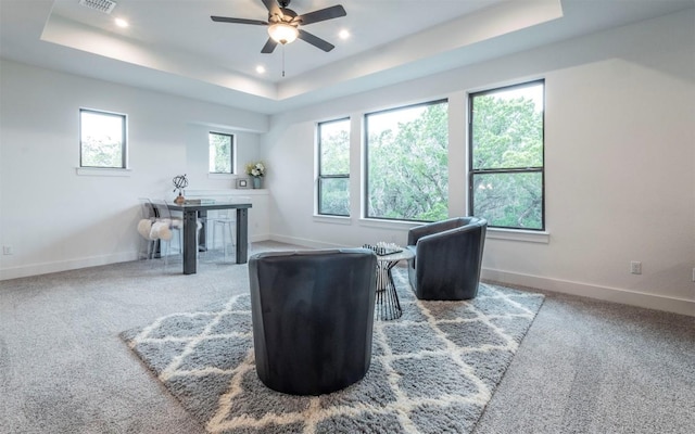 5408 Destination Way, Jonestown, TX 78645 - sitting room with a tray ceiling, a ceiling fan, carpet, and recessed lighting