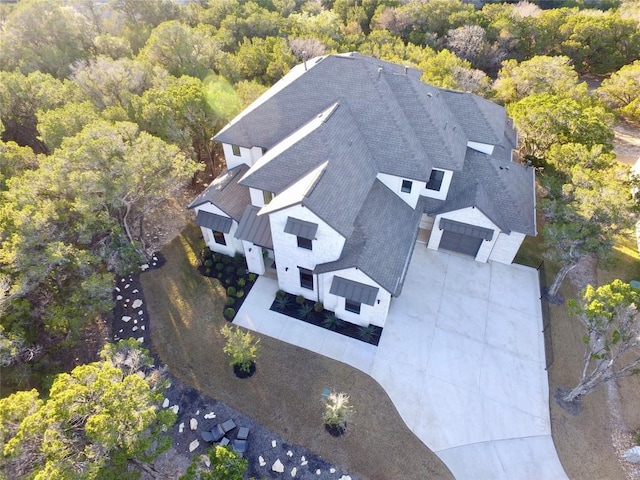 5408 Destination Way, Jonestown, TX 78645 - aerial view of property and surrounding area with a heavily wooded area