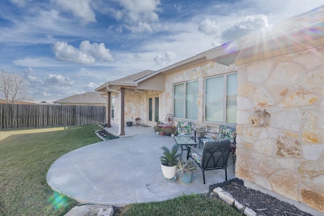 view of patio / terrace with fence