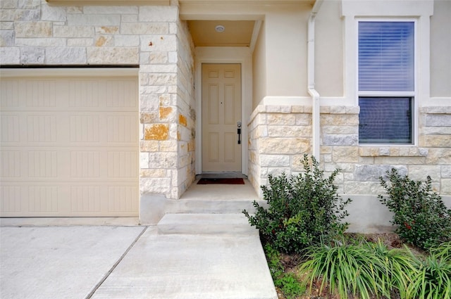 entrance to property with a garage