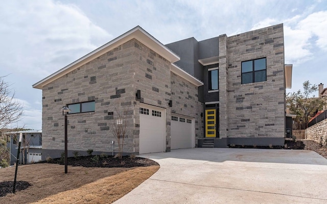 modern home featuring a garage