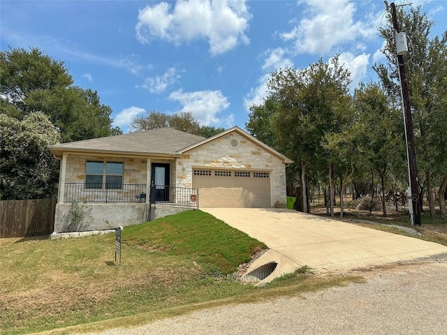 ranch-style house with a front yard and a garage