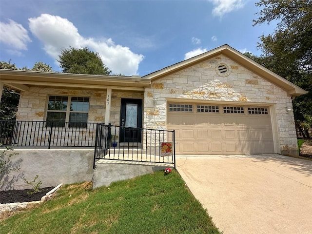 ranch-style home with a garage