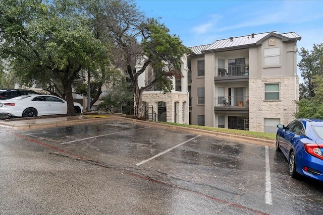 6000 Shepherd Mountain Cv Unit 1818, Austin, TX 78730 - view of uncovered parking lot