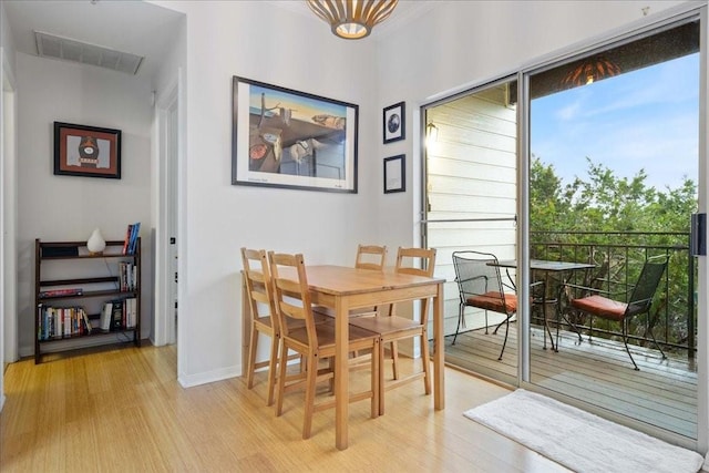 6000 Shepherd Mountain Cv Unit 1818, Austin, TX 78730 - dining space featuring light wood finished floors and baseboards