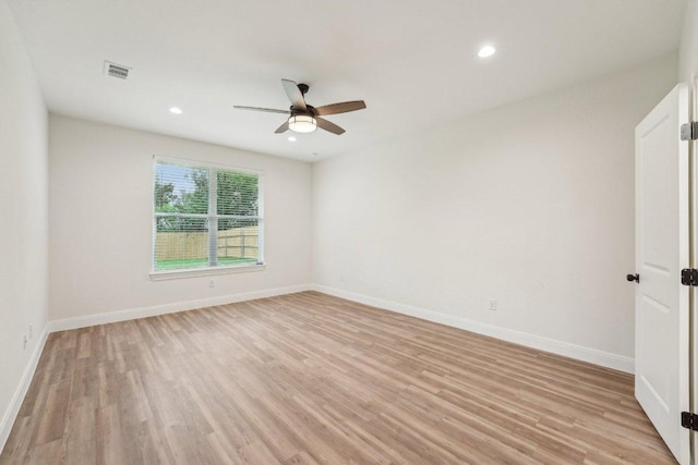 empty room with light wood finished floors, baseboards, visible vents, recessed lighting, and ceiling fan