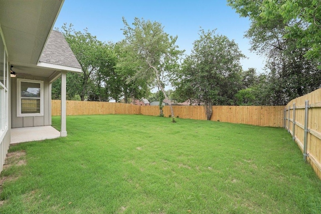 view of yard featuring a fenced backyard
