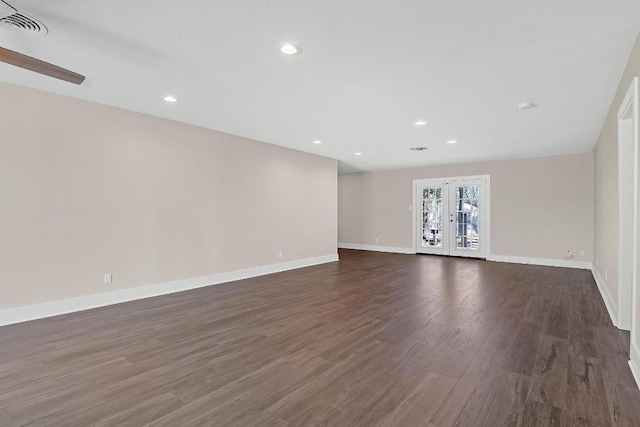 1808 Belford Dr, Austin, TX 78757 - unfurnished living room with dark wood-type flooring and recessed lighting