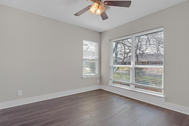 1808 Belford Dr, Austin, TX 78757 - empty room featuring healthy amount of natural light, dark wood-type flooring, and ceiling fan