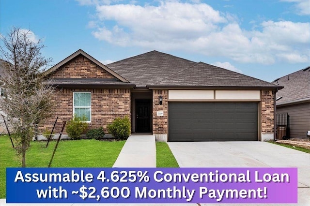 view of front of home featuring driveway, a garage, a shingled roof, a front yard, and brick siding