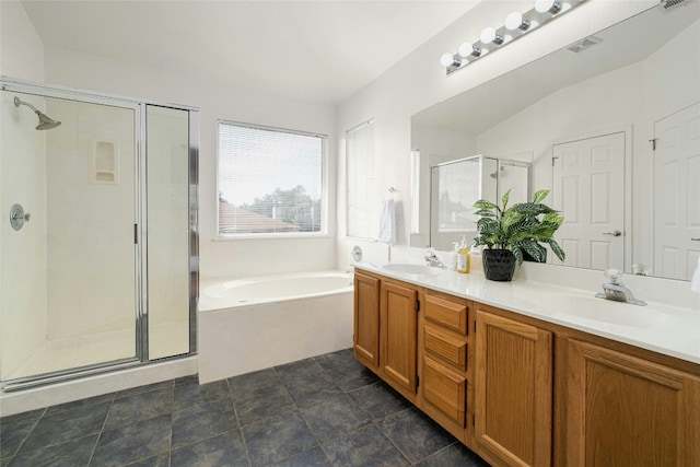 bathroom with plus walk in shower and vanity