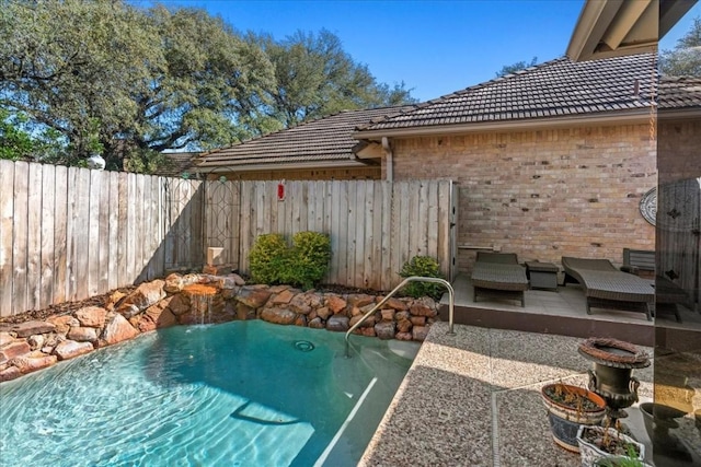 view of pool with a patio area