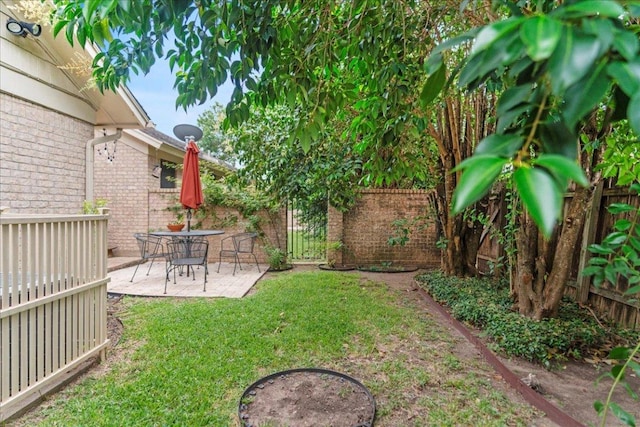 10920 Crown Colony Dr Unit C, Austin, TX 78747 - view of yard featuring a patio