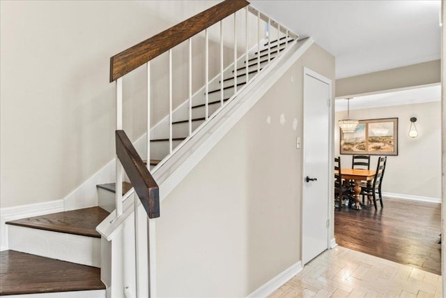 10920 Crown Colony Dr Unit C, Austin, TX 78747 - stairway featuring baseboards and wood finished floors