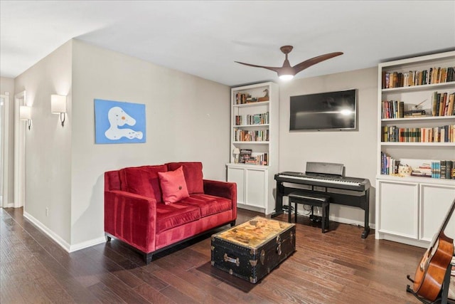 10920 Crown Colony Dr Unit C, Austin, TX 78747 - living room featuring wood finished floors, ceiling fan, baseboards, and built in features
