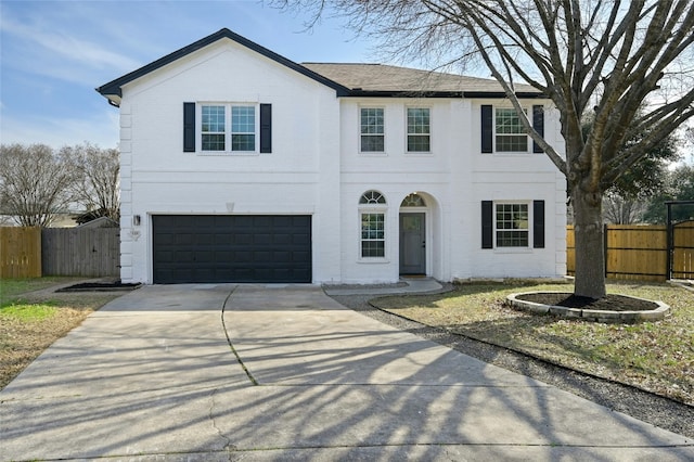 view of front of property with a garage