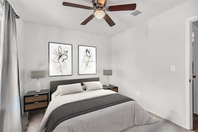 carpeted bedroom with ceiling fan