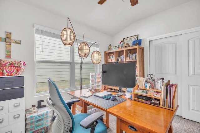 office space featuring ceiling fan, a wealth of natural light, and lofted ceiling