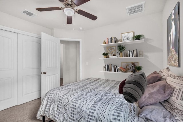 bedroom featuring carpet floors, a closet, and ceiling fan