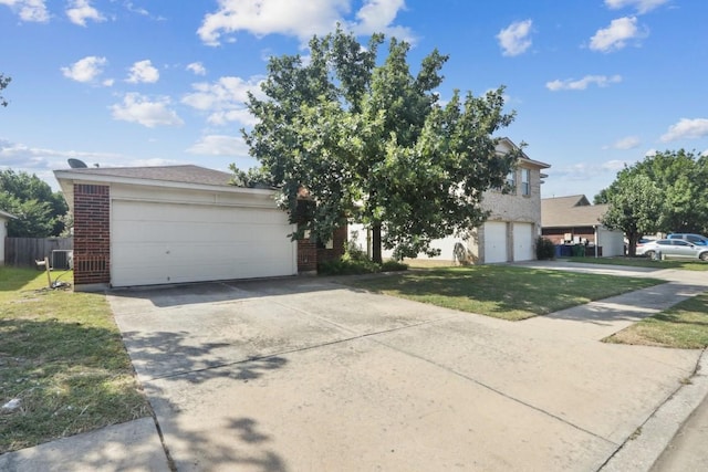 17405 Wiseman Dr, Pflugerville, TX 78660 - obstructed view of property featuring brick siding, driveway, and central AC unit