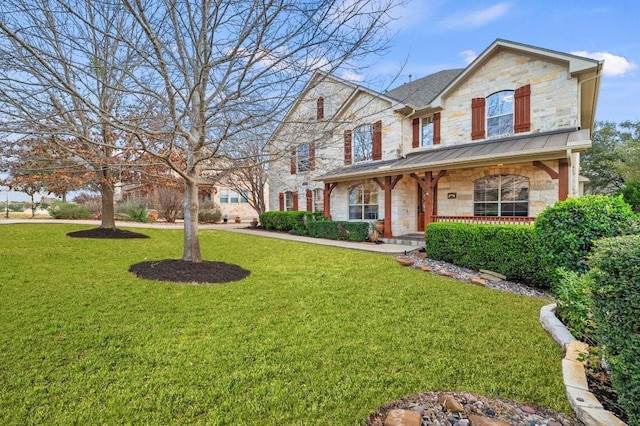 view of front of home with a front lawn and a porch