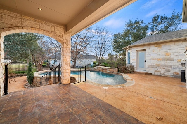 view of pool featuring a patio area