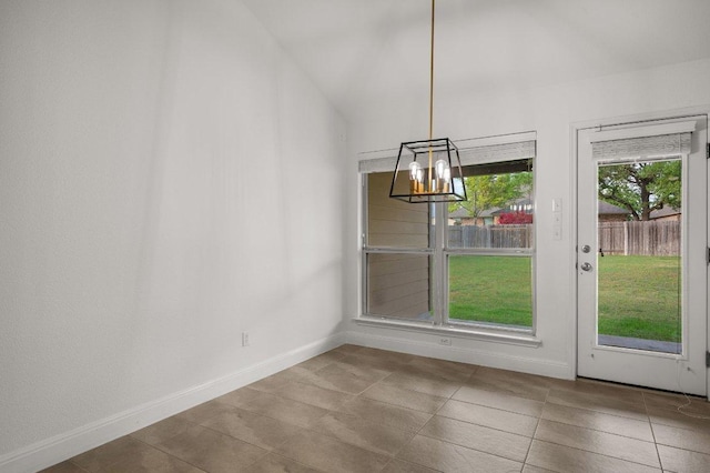 578 Ledge Stone Dr, Austin, TX 78737 - unfurnished dining area featuring a chandelier, tile patterned flooring, and baseboards