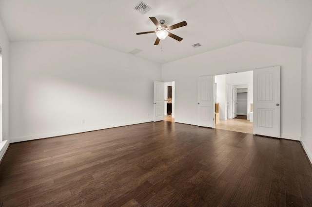 578 Ledge Stone Dr, Austin, TX 78737 - unfurnished bedroom featuring lofted ceiling, wood finished floors, baseboards, and a ceiling fan