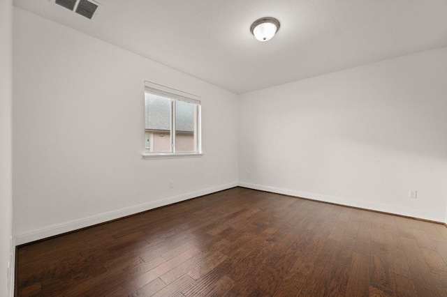 578 Ledge Stone Dr, Austin, TX 78737 - empty room featuring dark wood-type flooring and baseboards