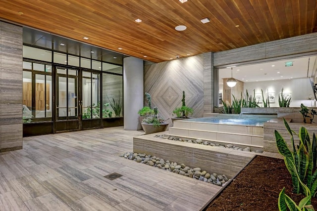 501 W Ave Unit 2904, Austin, TX 78701 - common area featuring wood ceiling and recessed lighting