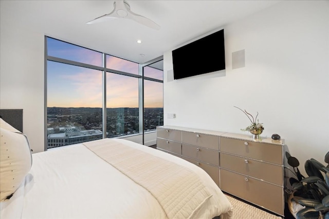 501 W Ave Unit 2904, Austin, TX 78701 - bedroom with a wall of windows and a ceiling fan