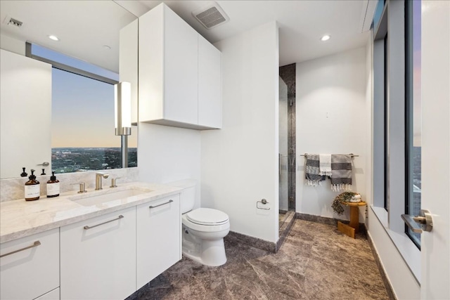 501 W Ave Unit 2904, Austin, TX 78701 - full bath with vanity, an enclosed shower, and recessed lighting