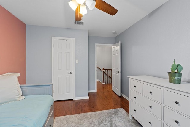 sitting room with hardwood / wood-style flooring and ceiling fan