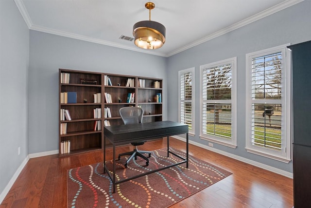 home office with ornamental molding and hardwood / wood-style floors