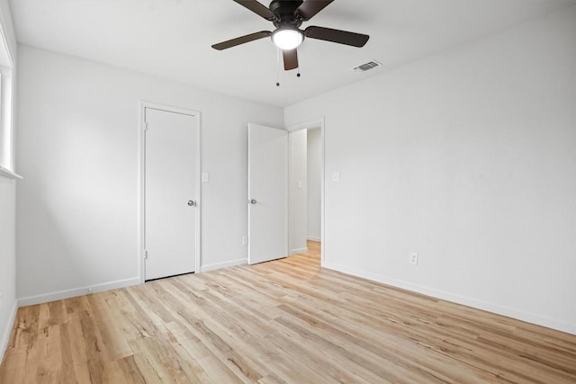 unfurnished bedroom featuring ceiling fan and light hardwood / wood-style flooring