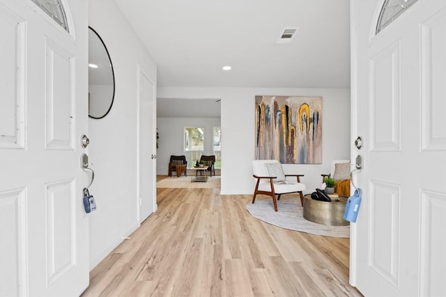 foyer entrance featuring light hardwood / wood-style flooring