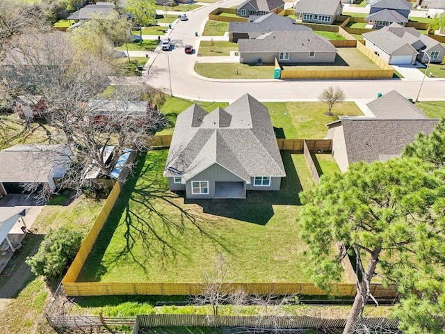 birds eye view of property with a residential view