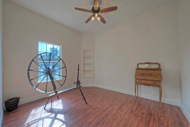 interior space with hardwood / wood-style floors and ceiling fan