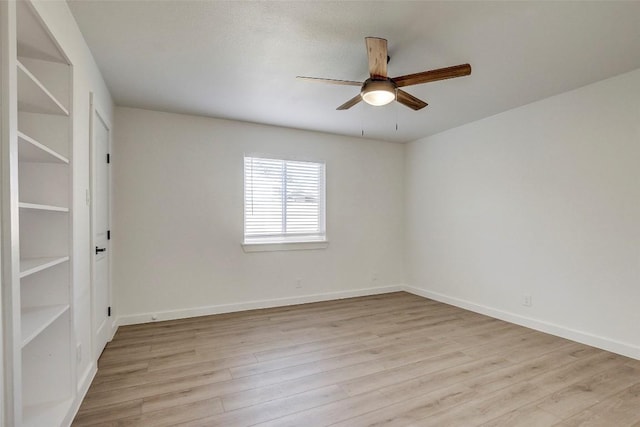 1402 Valleyridge Cir, Austin, TX 78704 - unfurnished room featuring a ceiling fan and light wood-type flooring