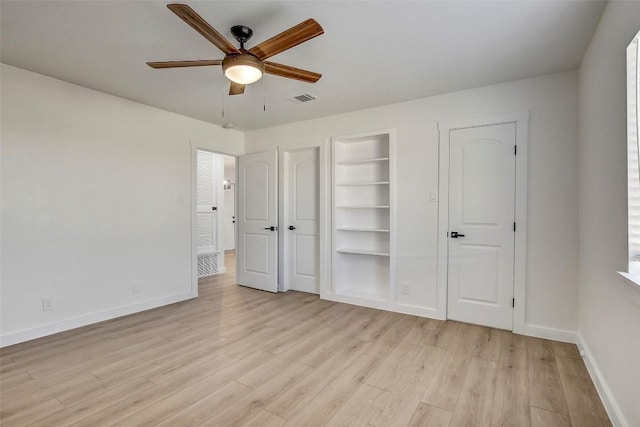 1402 Valleyridge Cir, Austin, TX 78704 - unfurnished bedroom featuring light wood-style flooring and ceiling fan