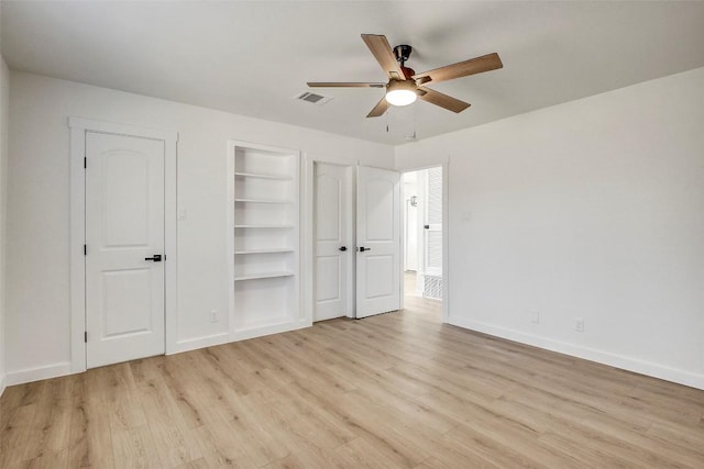 1402 Valleyridge Cir, Austin, TX 78704 - unfurnished bedroom featuring light wood-style floors and ceiling fan
