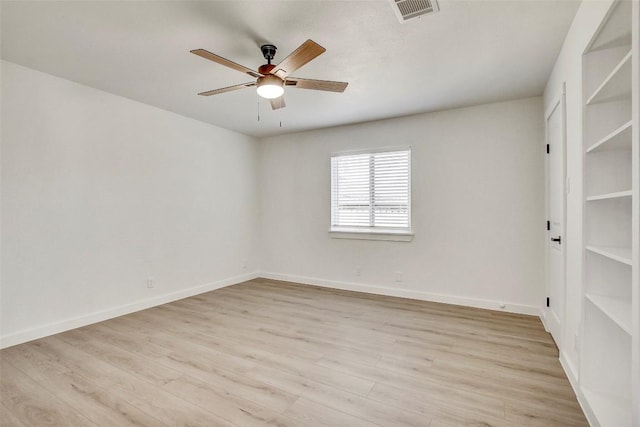 unfurnished room with light hardwood / wood-style floors and ceiling fan