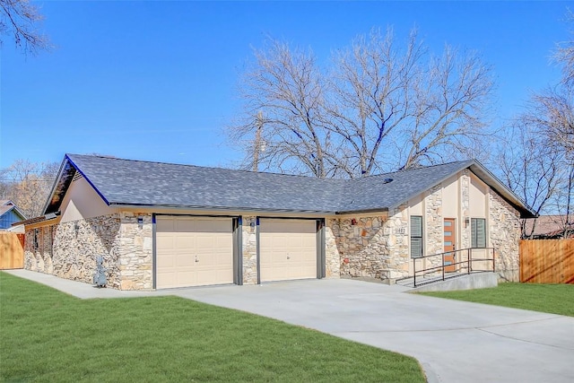 1402 Valleyridge Cir, Austin, TX 78704 - view of front of property featuring stone siding, an attached garage, driveway, and a shingled roof