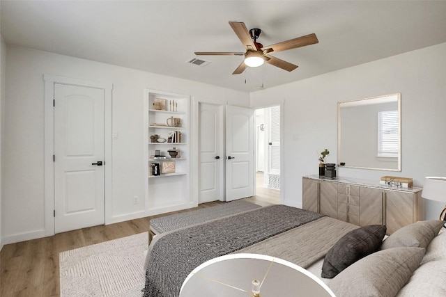 1402 Valleyridge Cir, Austin, TX 78704 - bedroom featuring light wood finished floors and a ceiling fan