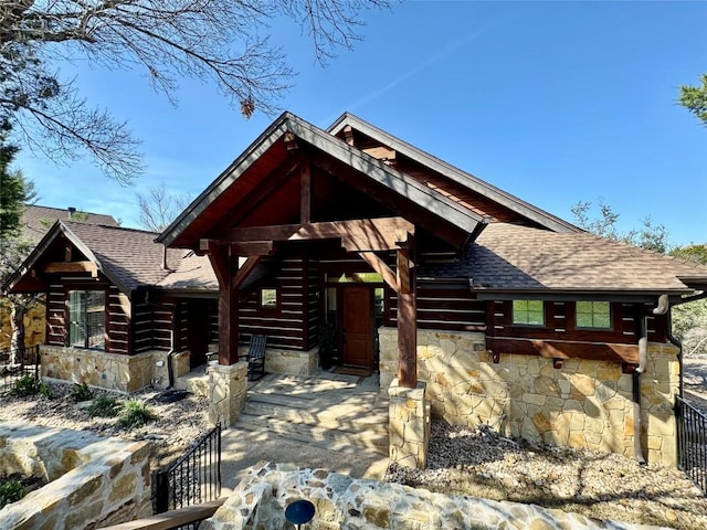 view of log cabin