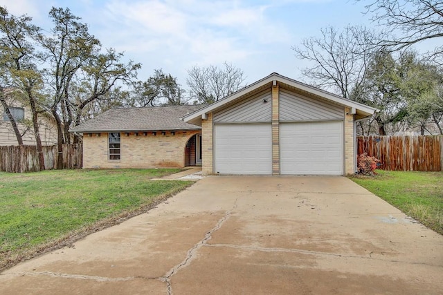 single story home with a front lawn and a garage