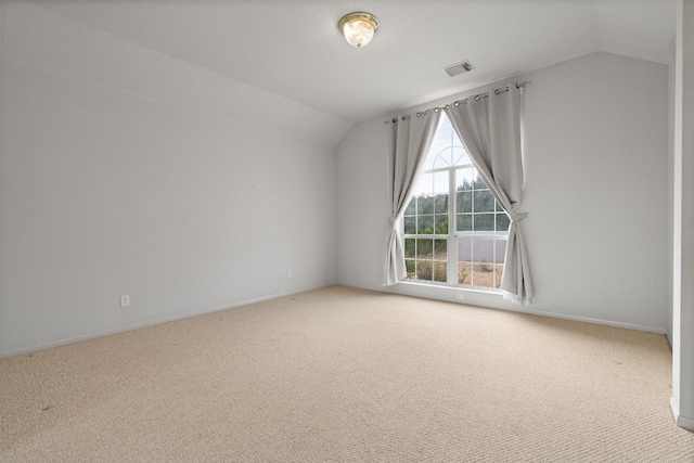 bonus room featuring carpet floors and lofted ceiling