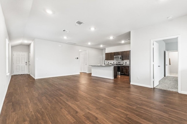 unfurnished living room with dark hardwood / wood-style floors